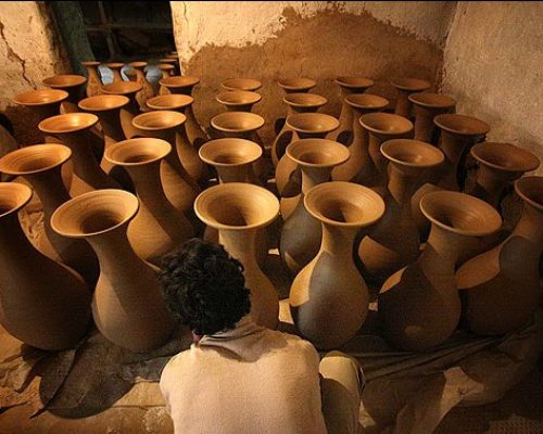 learning pottery making in Iran